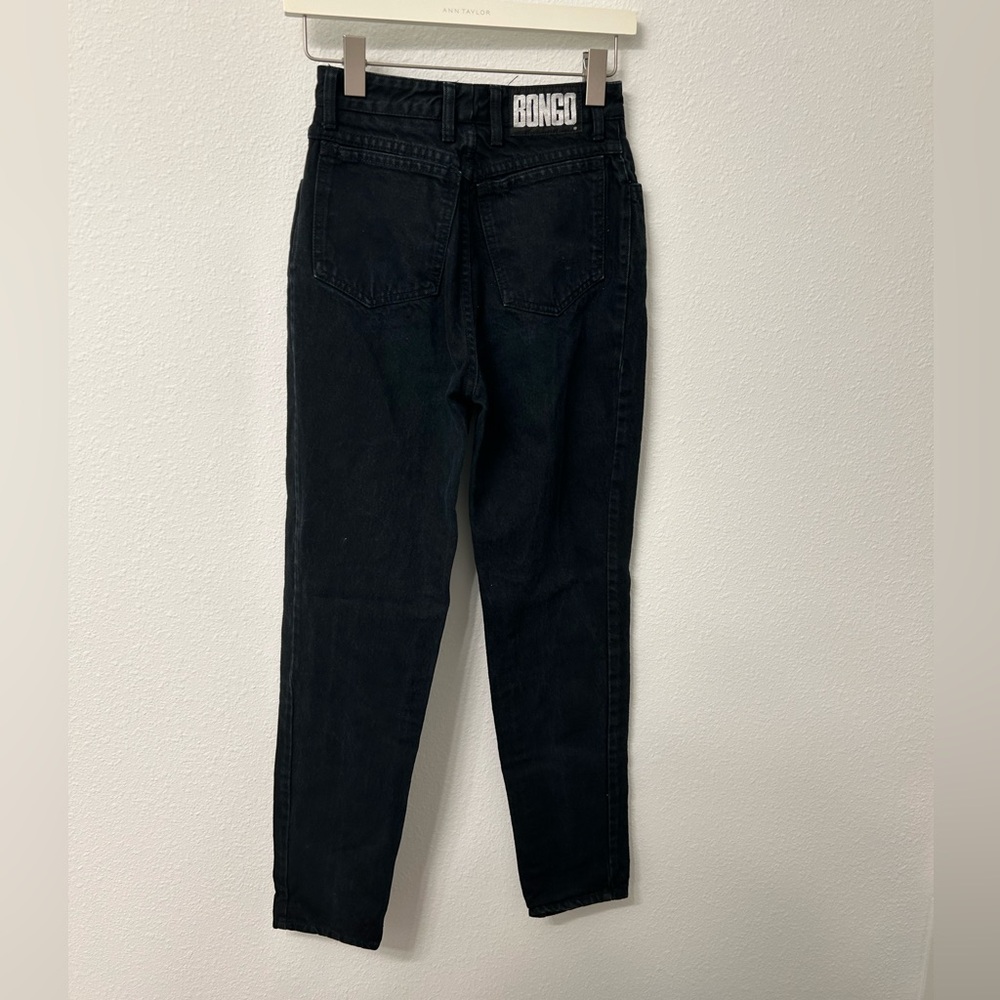 Black denim jeans with a straight leg fit and 5 pocket design #90s